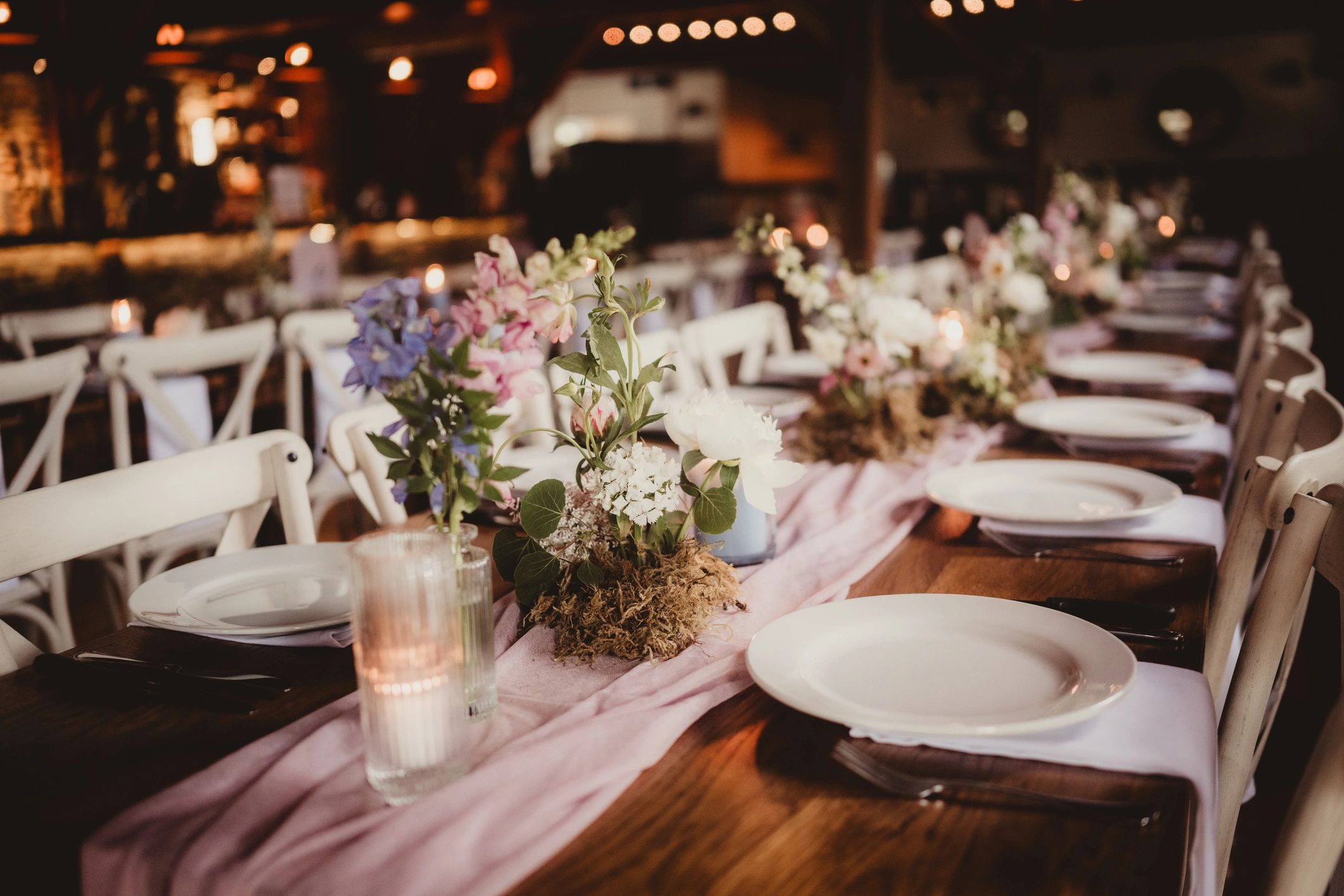 Beautifully decorated wedding venue with floral arrangements